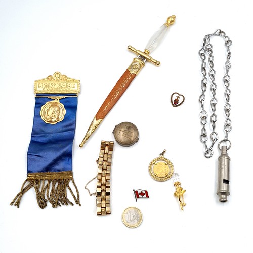 489 - A Spanish ormolu letter opener in the form of a dagger, together with a gold metal bracelet with saf... 