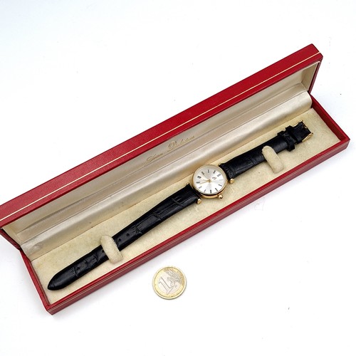 499 - A Jean Delatour wrist watch with leather strap. Watch appears to be in unused condition.