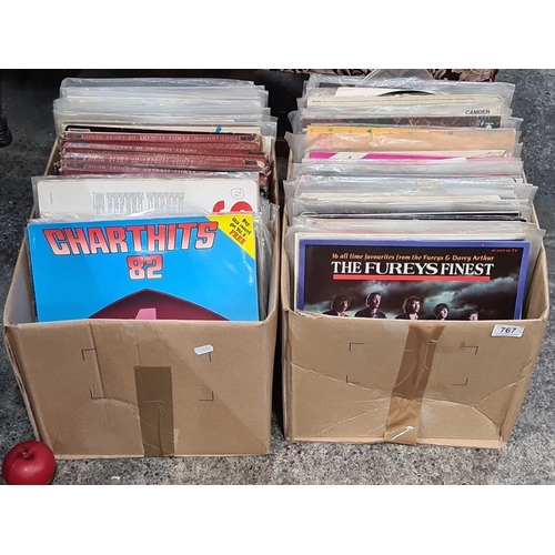 767 - Two boxes of assorted vinyl records, including 