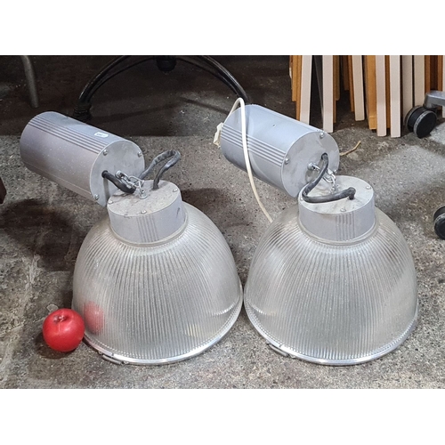 769 - Pair of industrial large  ceiling lamps by Microlights, model P1-132R. Metal construction with ribbe... 