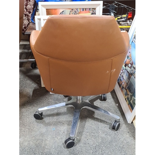 772 - Star lot : Sitland executive office chair, Italian-made, with tan leather upholstery and a swivel ba... 