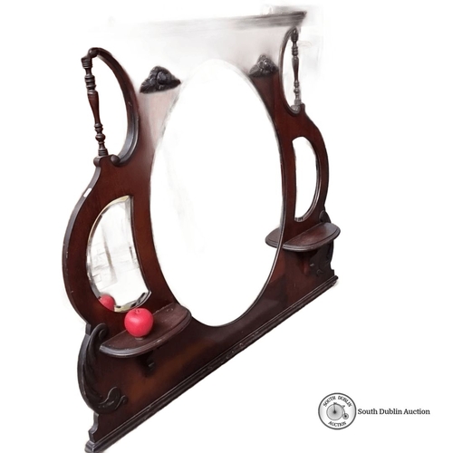 1021 - Edwardian mahogany overmantel mirror with decorative carvings and dual side shelves, featuring an ov... 