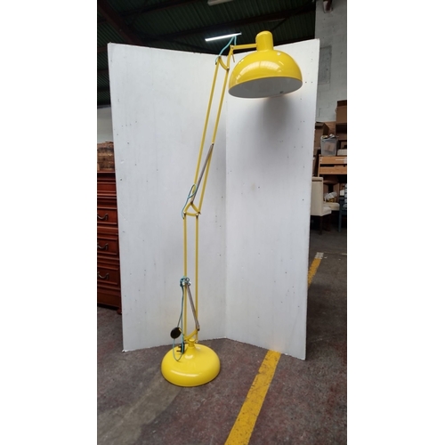 1028 - Contemporary adjustable yellow anglepoise large  floor lamp features durable metal construction and ... 