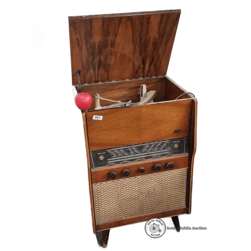 957 - Mid-century Pilot Radio Model 60 features a wooden cabinet and integrated gramophone. Manufactured b... 