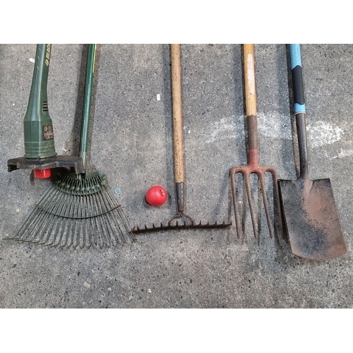 959 - Lot of five garden tools, including Black & Decker Autofeed Strimmer GL 330, rake, fork, and spade.