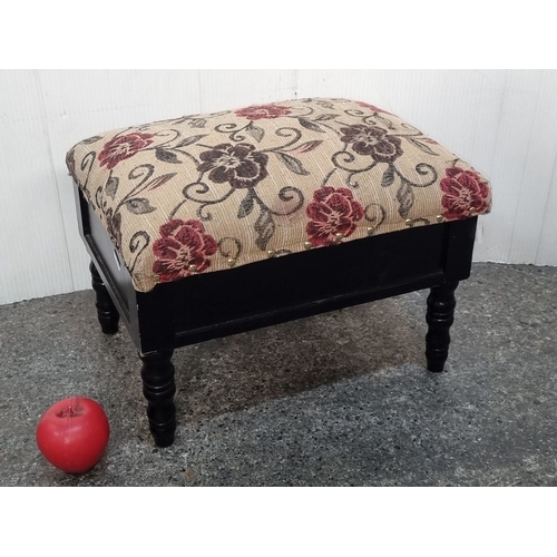 962 - Victorian-style wooden footstool with floral upholstered cushion, featuring a hinged lid for storage... 