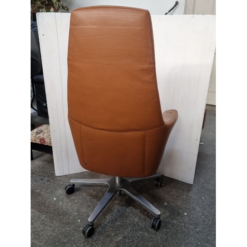 965 - Star lot : Sitland executive office chair, Italian-made, with tan leather upholstery and a swivel ba... 