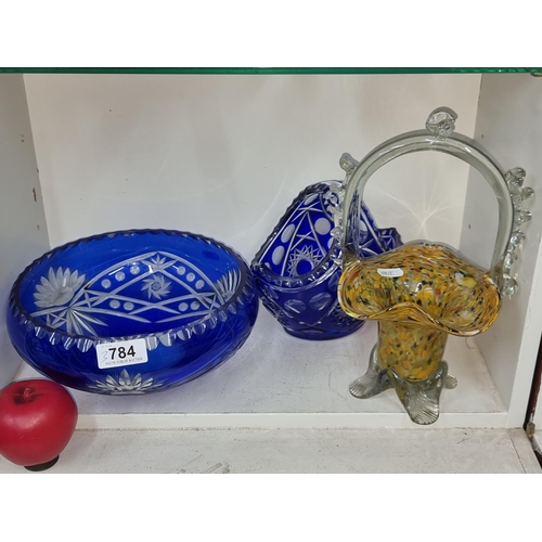 784 - A pair of Bohemian cobalt blue cut crystal pieces including a centre piece fruit bowl and basket, al... 