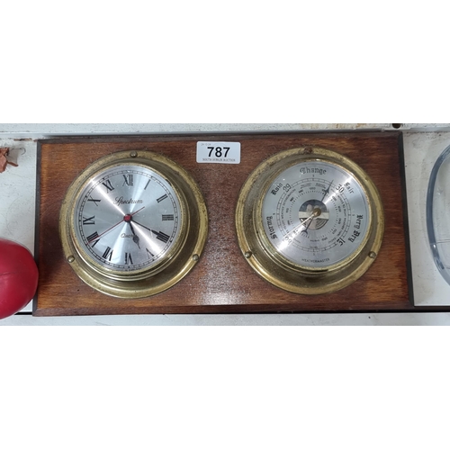 787 - A wooden wall plaque featuring a Spectrum Quartz clock and Weathermaster Barometer with brass fittin... 