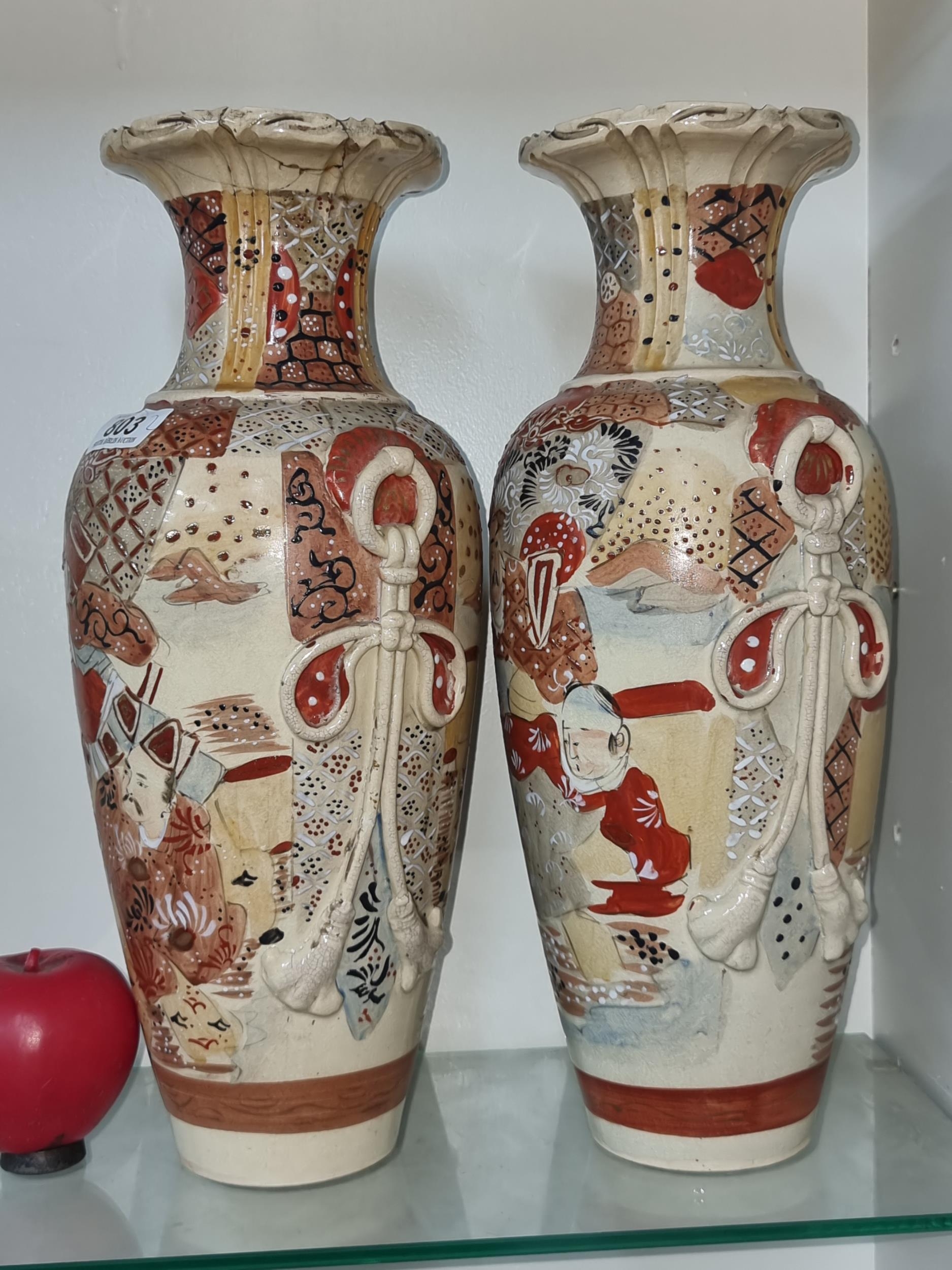 A large pair of antique Japanese Satsuma baluster vases. One has been