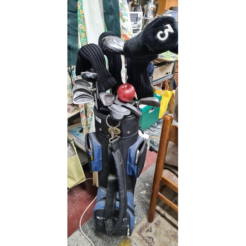 861 - A mixed lot of golf clubs of drivers, putters and irons.  Includes 'Wilson' and 'Colt'. Housed in a ... 