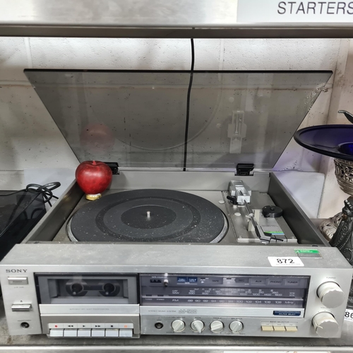 872 - A vintage Sony turntable stereo music system JJ-500 and cassette deck. Selling online for £75.99+