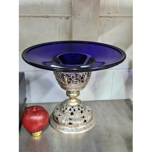 873 - A substantial silver plated pierced table centre with Bristol blue glass liner. very impressive.