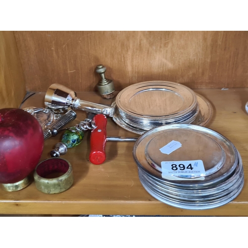 894 - A mixed lot of vintage bar related items including silver plated coasters and cork screws.