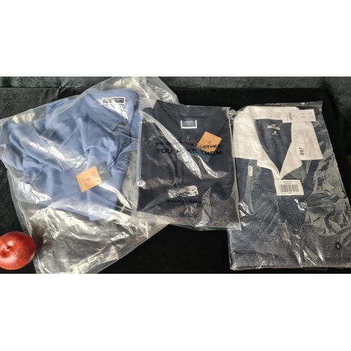 897 - Three brand new men's polo t-shirts including two medium Charles Tyrwhitt and one large Hollister.