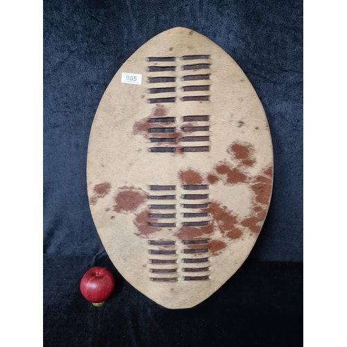 905 - A highly fascinating vintage African Zulu shield made from antelope hide , known as a 