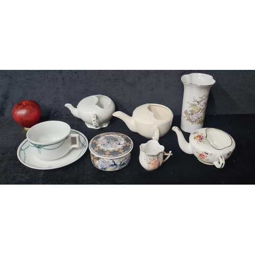 922 - A mixed assortment of vintage ceramics including a tall hand painted vase, teapots and a Japanese li... 