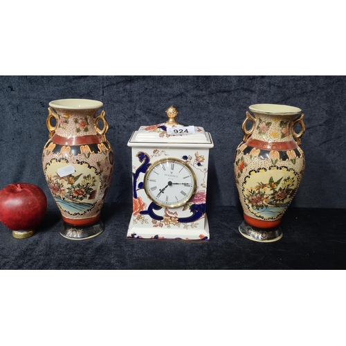 924 - Three items including a pair hand painted vintage Cloisonne vases and a Mason's carriage clock.