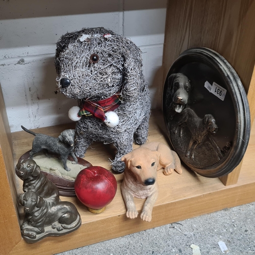 931 - A rather sweet selection of dog themed items including a wall plaque and garden ornament.