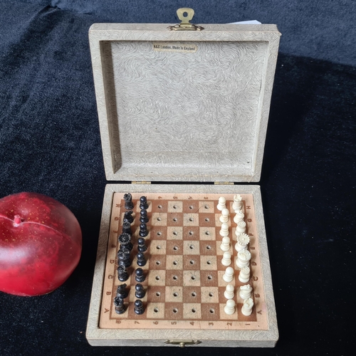 933 - A rather sweet vintage travel chess set produced by K&C London.