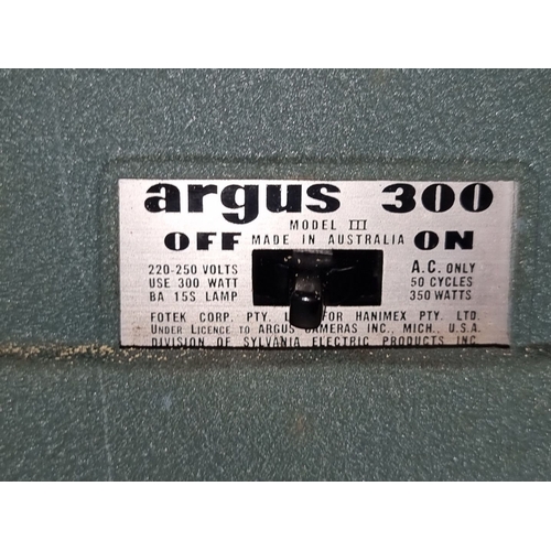 776 - Argus 300 vintage projector in original case. Classic mid-century design.