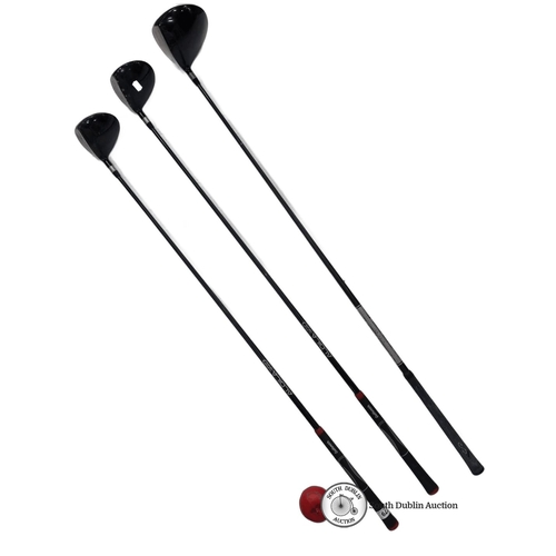 779 - Set of three golf clubs featuring Aldila VX shafts and Golfsmith grips, including a Snake Eyes model... 