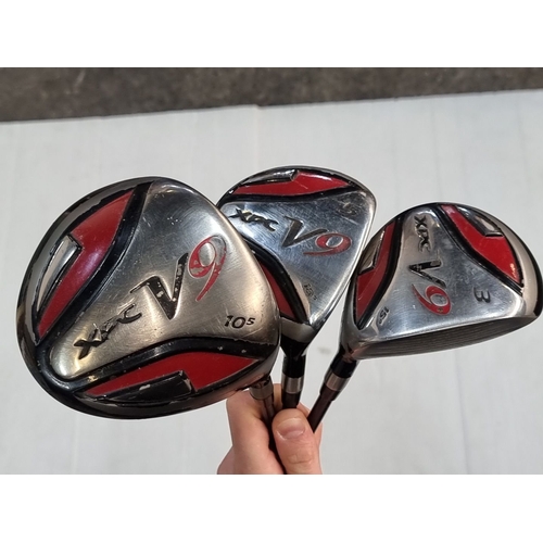 779 - Set of three golf clubs featuring Aldila VX shafts and Golfsmith grips, including a Snake Eyes model... 