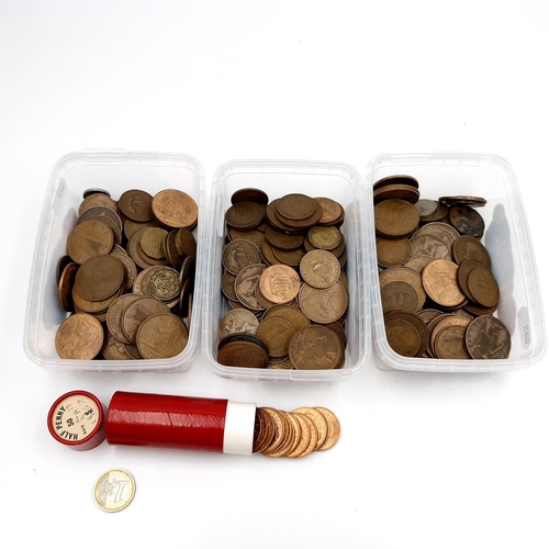 1033 - Three tubs of predicimal coins inc Irish examples and a partial half penny mint roll.