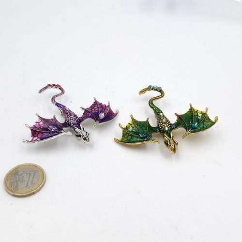 1049 - Two large dragon brooches inc a green and purple example