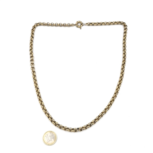 1057 - A heavy gold toned antique long Belcher chain.