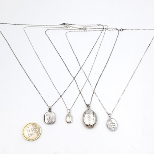 1070 - Four Sterling Silver Lockets all with sterling silver chains in good order.