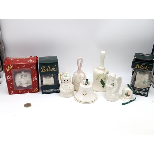 1074 - A collection of Belleek Fine China pieces including some bells and Christmas decorations.