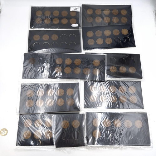 1075 - A large collection of British half pennies from dates such as 1937, 38, 39, 40, 41, 42, 43, 44, 45. ... 