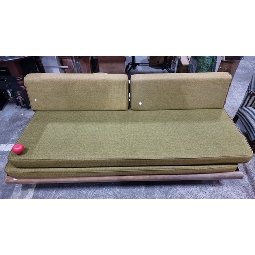 1154 - Star lot : A rare Mid century Modern American sofa with green upholstery and wooden frame. Approxima... 