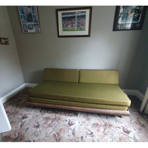 1154 - Star lot : A rare Mid century Modern American sofa with green upholstery and wooden frame. Approxima... 