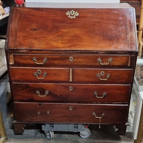 1156 - Star lot : A beautiful Georgian jamacian mahogany bureau with brass hardware. Approximately 100 cm h... 