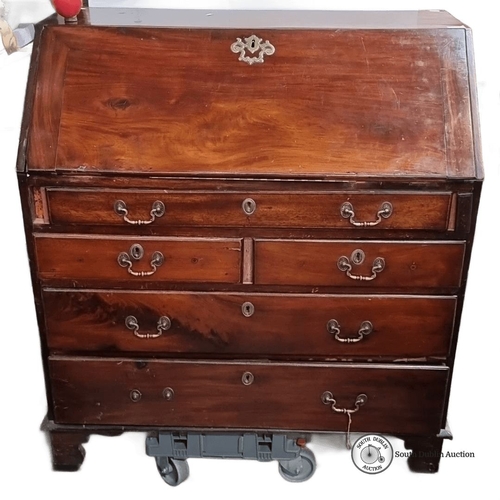 1156 - Star lot : A beautiful Georgian jamacian mahogany bureau with brass hardware. Approximately 100 cm h... 