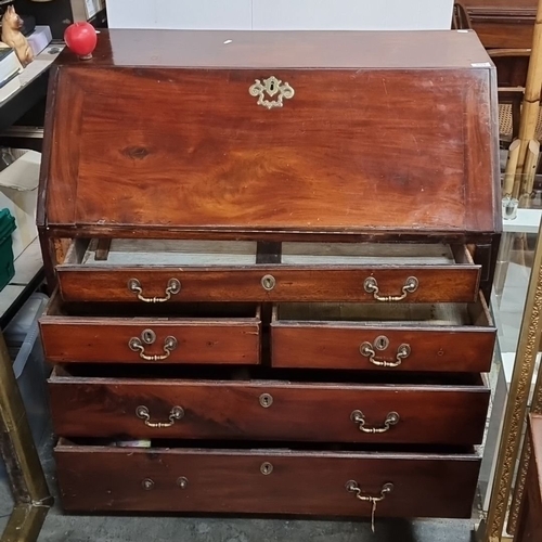 1156 - Star lot : A beautiful Georgian jamacian mahogany bureau with brass hardware. Approximately 100 cm h... 