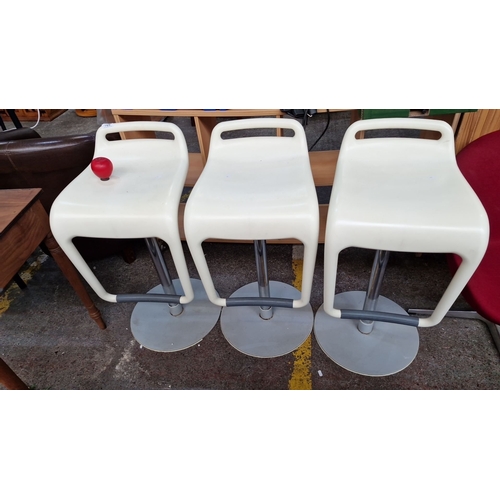 1165 - Star Lot : Set of three cream colored bar stools with sylinder System By Segis Italy for Pocci and D... 