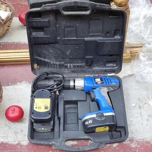 1219 - A PBX Power Base Excel hand drill with battery and charger. 14.4V. Model no. Working.
Previous in au... 