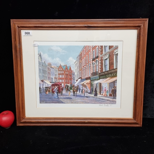 1253 - A giclee print of an original painting by by Charlie Bradley. Features an old Irish town. With 'Nost... 