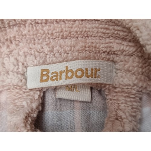 399 - A bag of mixed clothes and fabrics all in new or super condition including a new Barbour dressing go... 