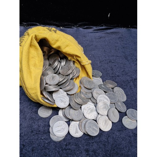 344 - A very heavy bag containing a huge collection of Irish Florin's dating to the 1950's and 60's. Lovel... 