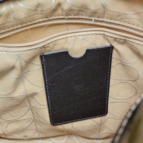 388 - A mixed lot of stylish ladies handbags including examples from Michael Kors, Jonathan Adler and Orla... 