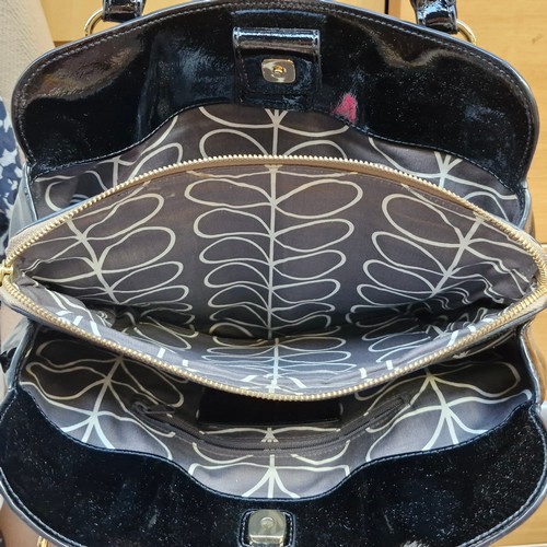 388 - A mixed lot of stylish ladies handbags including examples from Michael Kors, Jonathan Adler and Orla... 