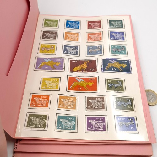 1077 - A large collection of vintage Irish stamps collectors packs. Two different types. About 60 packs wou... 