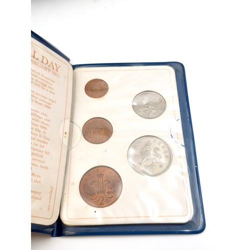 1034 - A box of commerative coins including 5 solid bronze large coins commemorating the launch of the pace... 