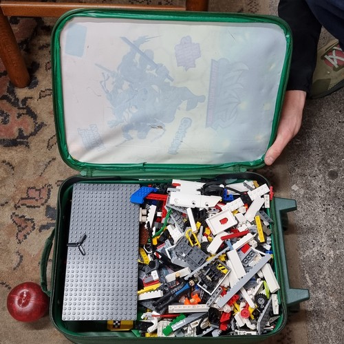 918 - A Teenage Mutant Ninja Turtles children's suitcase completely full of an assortment of LEGO.