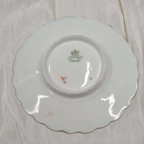 877 - Star Lot : A very pretty, early 20th century, Aynsley cup and saucer set with pierced sterling silve... 