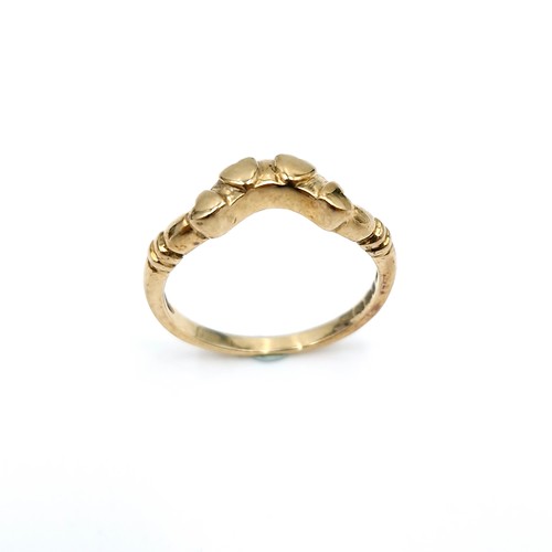 6 - A nine carat gold wishbone ring. Ring size - M1/2. Weight - 2.03g. Boxed.